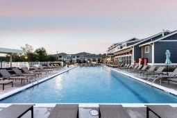 Heated pool with wetledge and lap lane